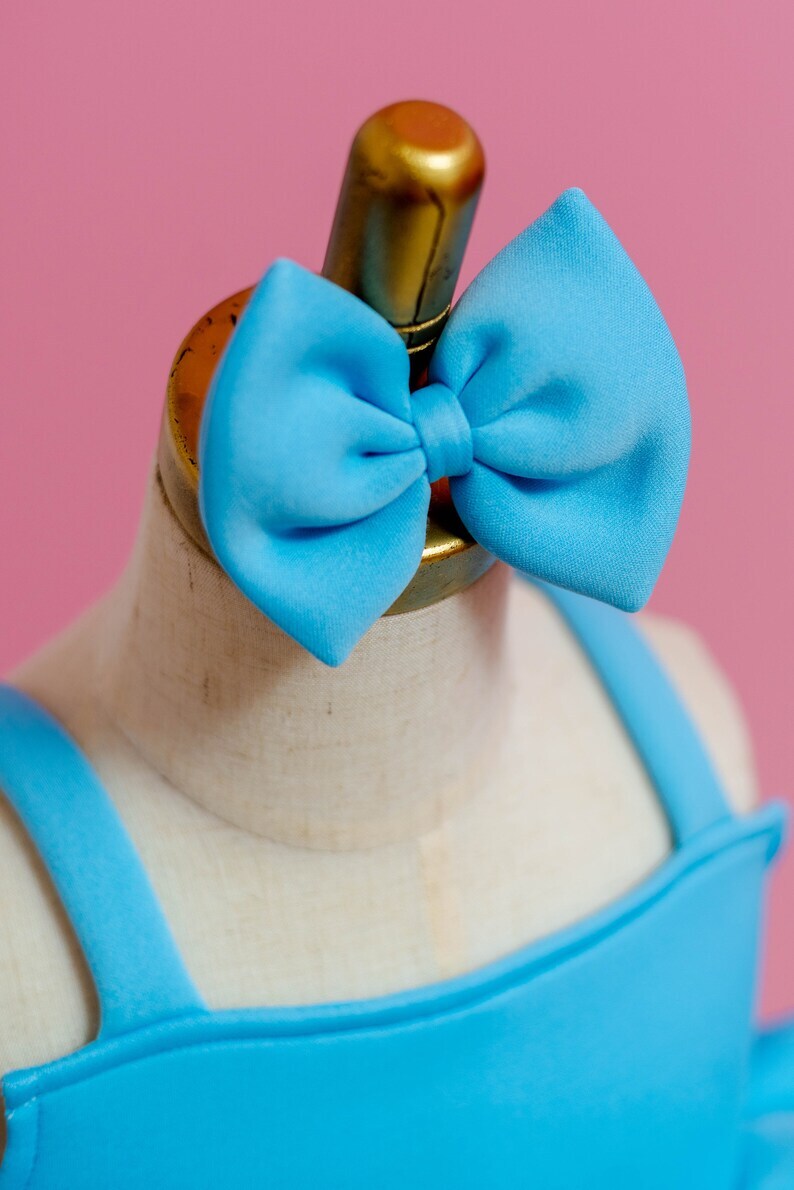 Matching head bow for sky blue side ruffle dress