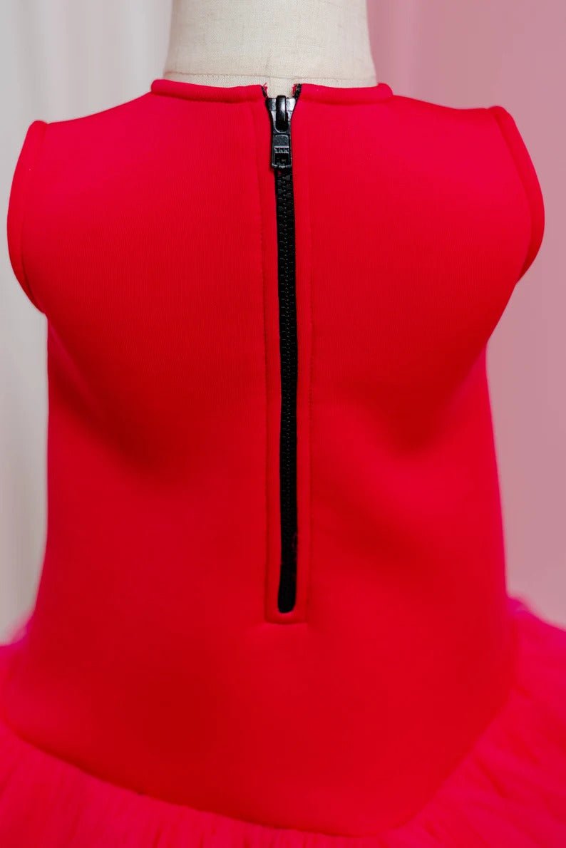 Back view showing zip of Fuchsia pink toddler dress, displayed on fashion stand