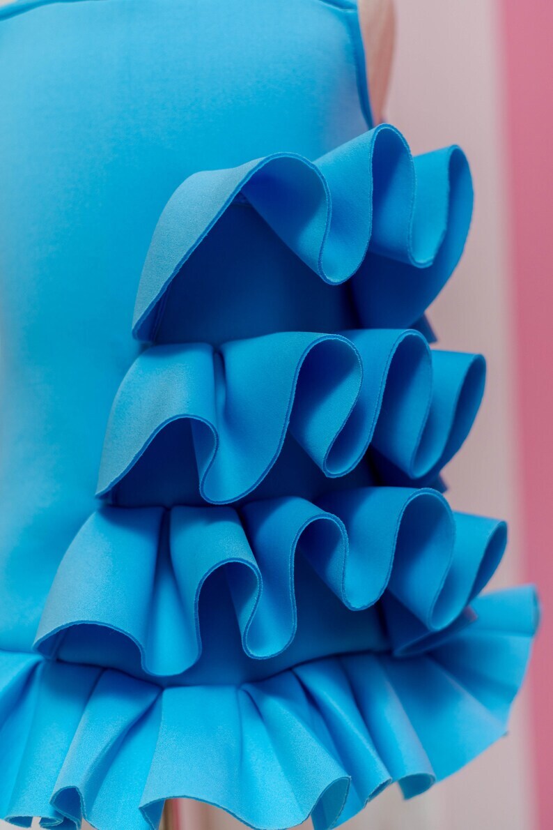 side ruffle of sky blue dress for little girls