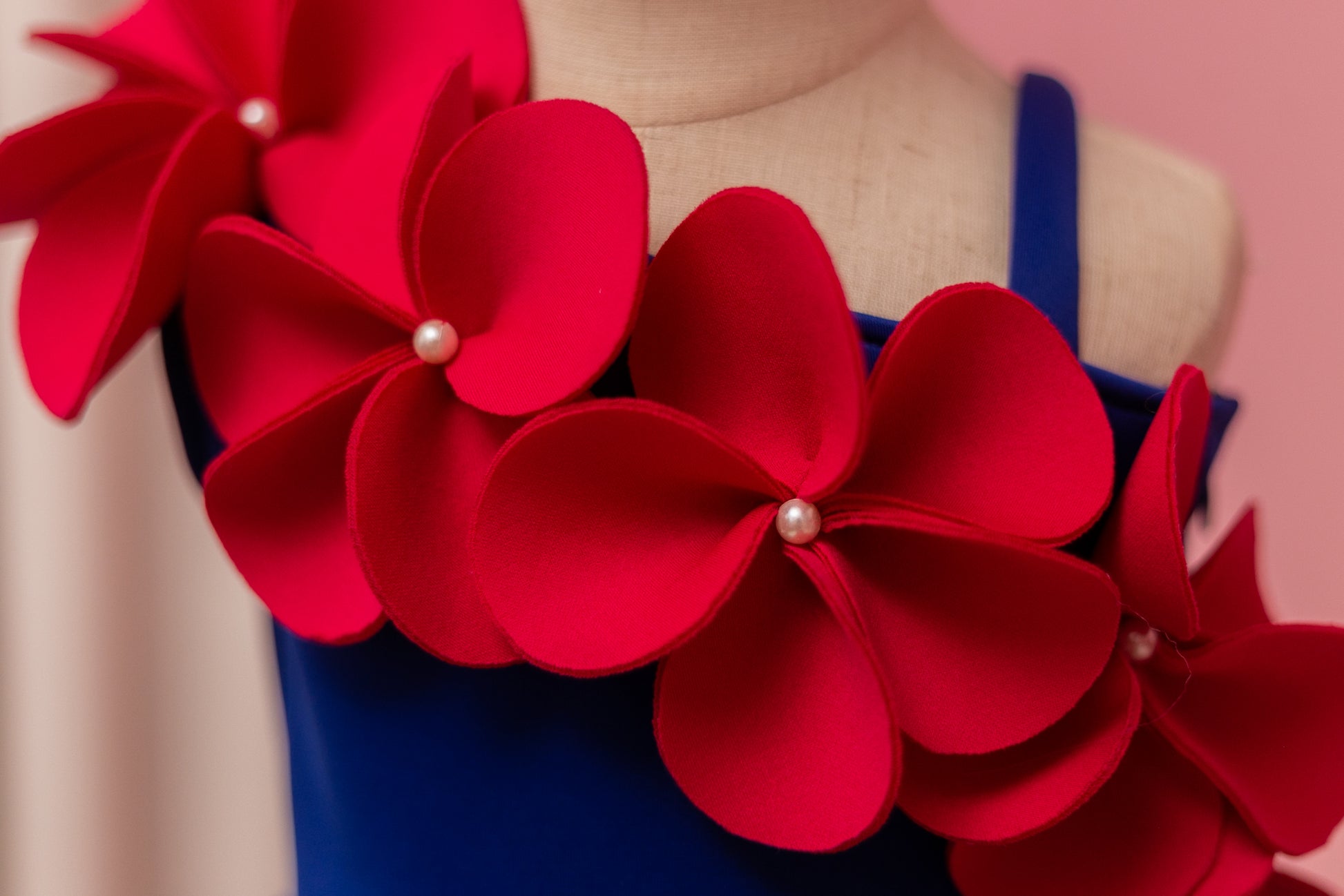 fuchsia pink flowers with pearls, on dress