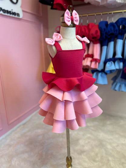 Sleeveless ruffle dress displayed on fashion stand